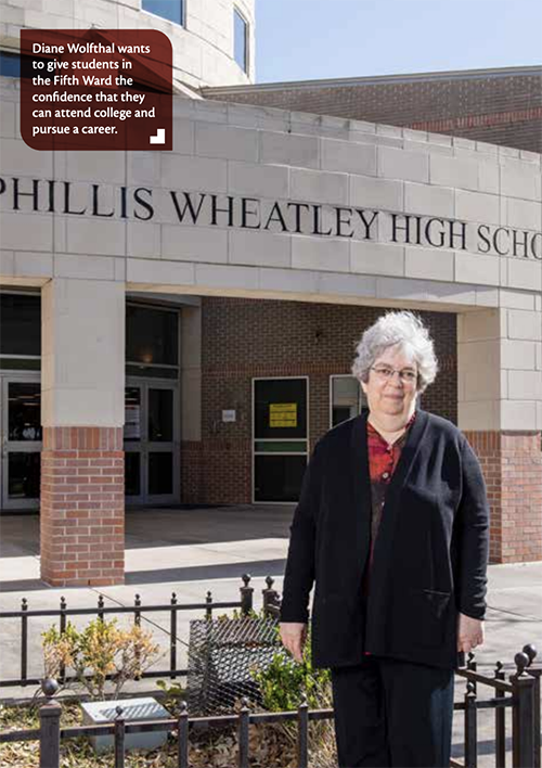 Diane Wolfthal in front of Phillis Wheatley High School