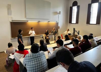 students presenting to a classroom