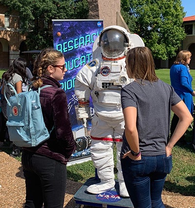 Girls at the STEM festival inquired about how to apply to be an astronaut.