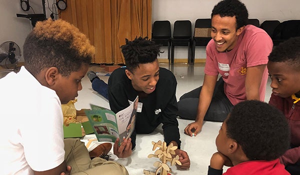 Rice students tutor students from Longfellow Elementary
