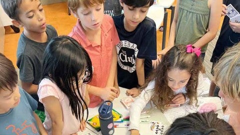 Students expand their knowledge about math while having fun with games.